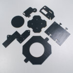 Custom adhesive lead parts for radiation shielding of equipment