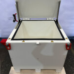 lead shielded decay cave with actuator to open lid