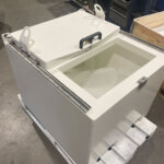 lead shielded decay container with opened sliding lid